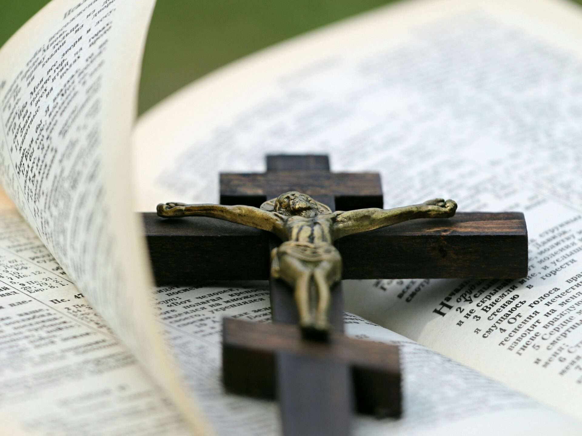 cross and bible representing obedience to God's Word